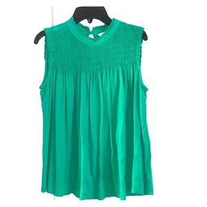 Green sleeveless smocked front size Small top